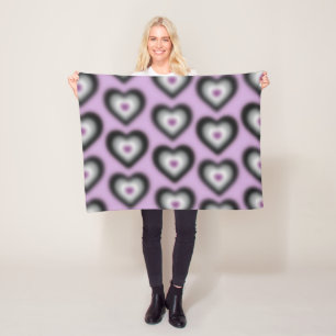 Asexual flag colours on a blurred heart fleece blanket