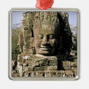 Asia, Cambodia, Siem Reap. Angkor Thom, heads of Metal Tree Decoration