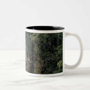 Asia, Cambodia, Siem Reap. Huge stone sculptures Two-Tone Coffee Mug
