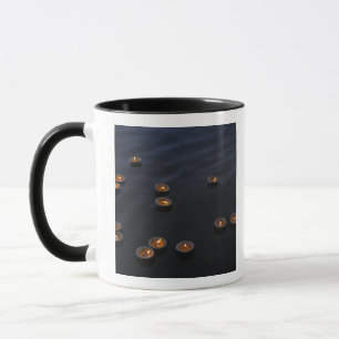 Asia, India, Varanasi Region. Offerings in the Mug