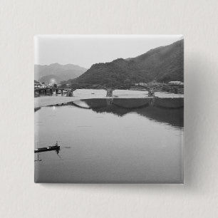 Asia, Japan, Iwakuni. Fishermen and historic 15 Cm Square Badge