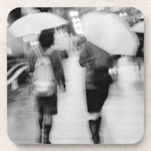 Asia, Japan, Tokyo. Young women and umbrellas. Coaster