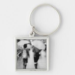 Asia, Japan, Tokyo. Young women and umbrellas. Key Ring
