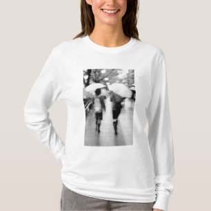 Asia, Japan, Tokyo. Young women and umbrellas. T-Shirt