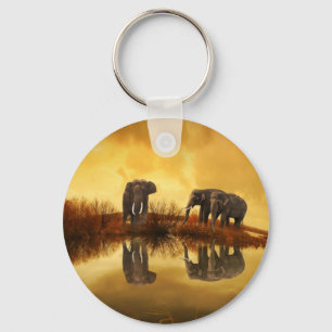 Asian Elephants in Thailand under a glowing sunset Key Ring