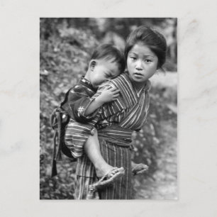 Asian girl carrying child on her back (1908) postcard