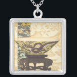 Asian Tapestry with Bowl and Dragon Design Silver Plated Necklace<br><div class="desc">A Vision Studios creation,  this decorative Asian tapestry style painting features a lovely bowl with a great dragon design. The bowl is set against a cream background with floral print. Give this as a gift,  or purchase it for yourself!</div>