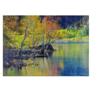 Aspen tree in autumn reflecting in Grant Lake Cutting Board