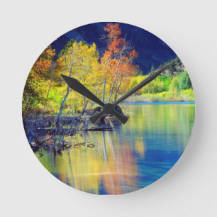 Aspen tree in autumn reflecting in Grant Lake Round Clock