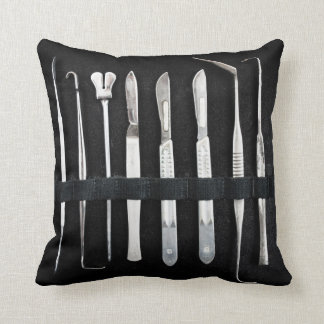 Assorted Antique Embalming Tools Cushion