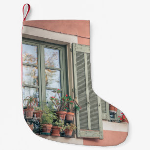 ASSORTED-COLOR FLOWERS IN VASE NEAR WINDOW SMALL CHRISTMAS STOCKING