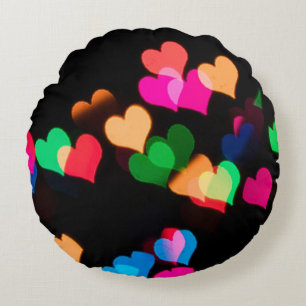 Assorted-colour hearts illustrations round cushion