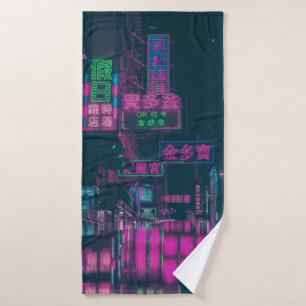ASSORTED NEON LIGHT SIGNAGE ON STREET DURING NIGHT BATH TOWEL