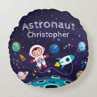 Astronaut child on the moon, monogrammed name round cushion