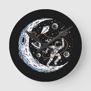 Astronaut Flying a Kite on the Moon Round Clock