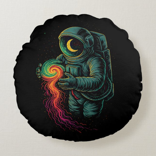 Astronaut Holding a Cosmic Spiral Round Cushion (Front)