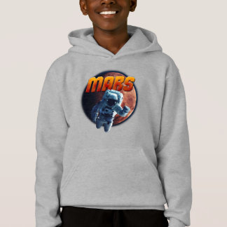 Astronaut in front of the Mars planet.