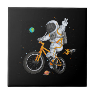 astronaut in spacesuit riding bmx bike on space ov ceramic tile