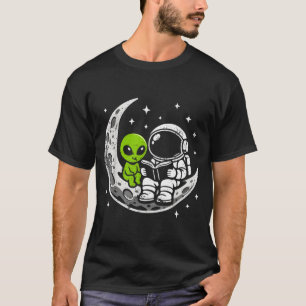 Astronaut reading book alien moon space T-Shirt