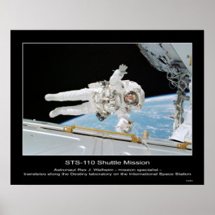 Astronaut Rex J. Walheim next to International Spa Poster