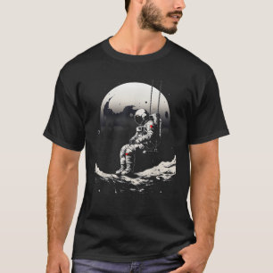 astronaut sitting on swing in space stars and moon T-Shirt