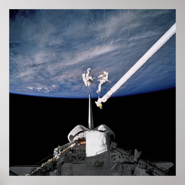 Astronauts conduct spacewalk above Discovery Poster (Front)
