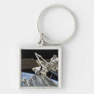 Astronauts perform a series of tasks key ring