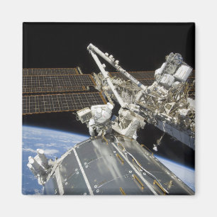 Astronauts perform a series of tasks magnet