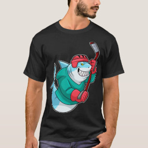 at Ice hockey with Ice hockey stick Helmet T-Shirt