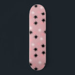 Atomic Pink Starbursts Skateboard Deck<br><div class="desc">This Atomic Pink Starbursts Skateboard Deck has all of the mid century modern fun of your grandma’s kitchen, minus the sticky linoleum. The kitschy design features a pink background with gold speckles and randomly placed starbursts in black and two shades of pink. This vintage inspired pattern is mod enough to...</div>