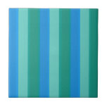 Atomic Teal & Turquoise Stripes Ceramic Tile<br><div class="desc">This Atomic Teal and Turquoise Stripes Small Ceramic Tile pattern is styled after classic, mid century modern, upholstery fabric, with simulated nubby texture. The retro wide and thin stripes alternate in shades of teal, turquoise, and vibrant, sky blue. The tranquil colours might remind you of a day at the beach,...</div>