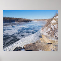 Atop cliff overlooking frozen mississippi river