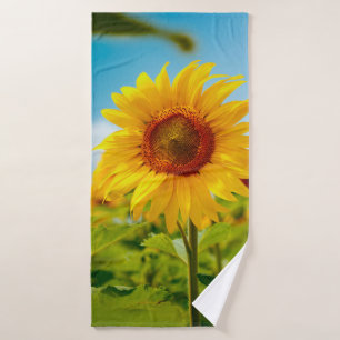 Attractive field with bright yellow sunflowers clo bath towel