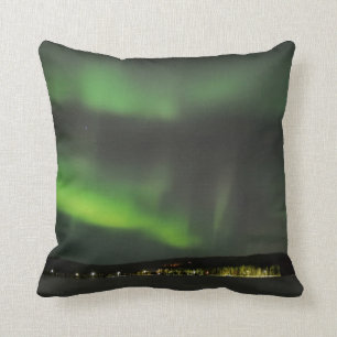 Aurora borealis in the sky throw pillow