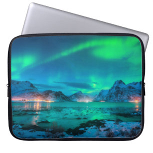 Aurora borealis over the sea coast, snowy mountain laptop sleeve
