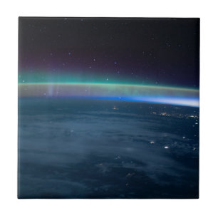 Aurora intersected with Earth's airglow from space Ceramic Tile