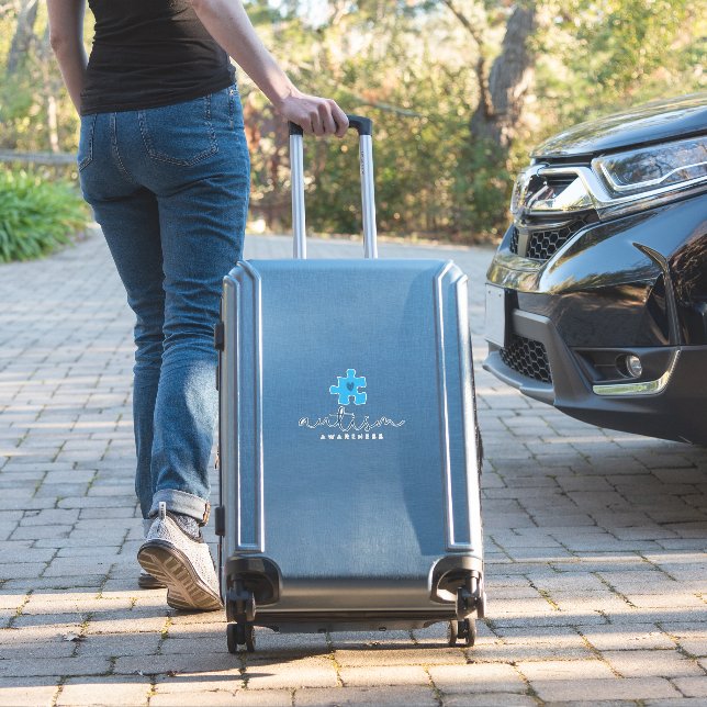 autism awareness blue puzzle piece heart  (Suitcase Insitu)