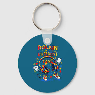 Autism awareness headphone dancing to a different key ring