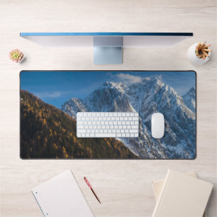 Autumn and winter at snowy mountains desk mat