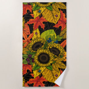 Autumn bouquet on black beach towel
