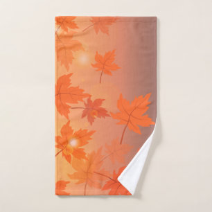 Autumn design with maple leaves and bokeh effect hand towel