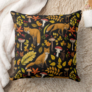 Autumn foxes on black cushion