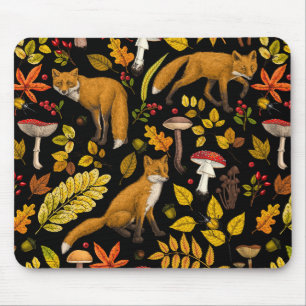 Autumn foxes on black mouse pad
