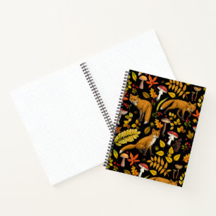 Autumn foxes on black notebook