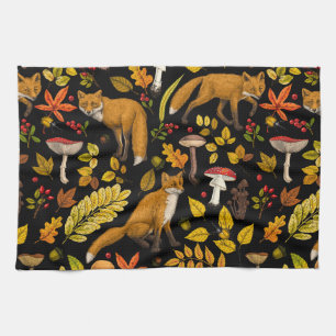 Autumn foxes on black tea towel