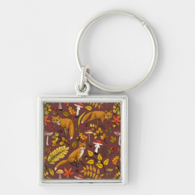 Autumn foxes on chocolate brown key ring (Front)
