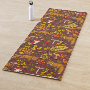 Autumn foxes on chocolate brown yoga mat