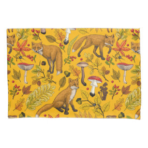 Autumn foxes on orange pillowcase