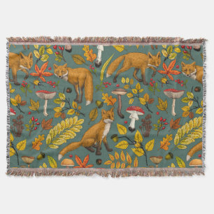 Autumn foxes on pine green throw blanket