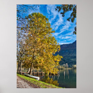 Autumn in Italy with tree and boat by the lake Poster